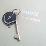 guest boom with a keyring and key on top